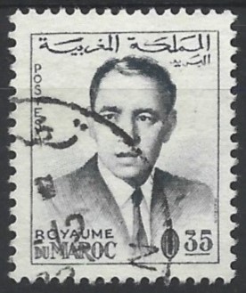 his power derives from god under Koranic law. The introduction of the first constitution was followed, in May 1963, by elections to the new house of representatives, Both the Istiqlal and UNFP contested the elections in opposition to the king and his newly formed royalist party, the Front for the Defense of Constitutional Institutions. ("Amnesty International briefing: Morocco". 10/1977: 2) 